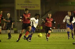 Stuart Douglas gets away from future Hatter Ian Roper