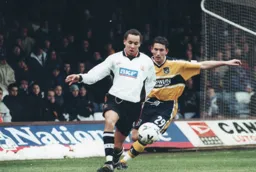 Liam George is closed down by Che Wilson