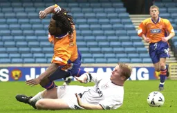 Stuart Douglas is chopped down by Stuart Nethercott