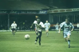 Stuart Douglas and Paul Hurst chase the ball