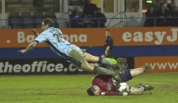 Mark Ovendale smothers the ball