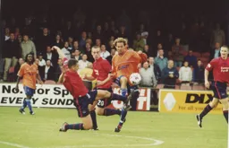 Liam George lays the ball off