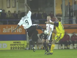 Liam George puts in a high tackle