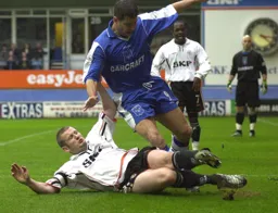 Kevin Nicholls slides in