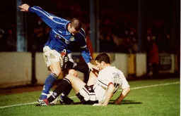 Chris Coyne makes sure the Halifax player does not get past