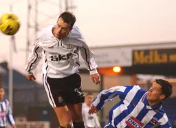 Ian Hillier nods the ball on