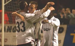 Matthew Taylor is congratulated after scoring the Town's first goal