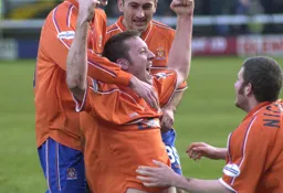 Steve Howard is congratulated by his team mates