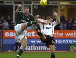 Dean Crowe battles against an uncompromising Plymouth defence