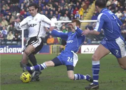 Jean-Louis Valois about to be tackled