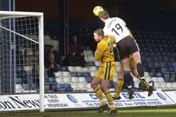 Steve Howard rises to head the Town's first goal