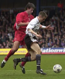 Matthew Taylor shields the ball