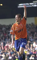 Peter Holmes celebrates after scoring the Town's second goal