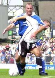 Dean Crowe getting unwanted attantion from the Cardiff player