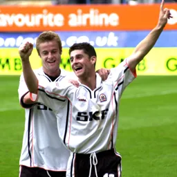 Steve Robinson celebrates