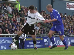 Tony Thorpe having his shirt pulled