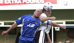 Steve Howard with a strong header