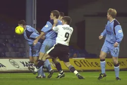 Tony Thorpe trying to win the ball