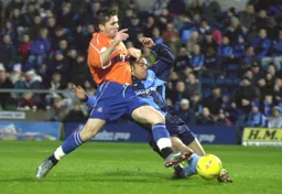 Tony Thorpe tries to beat the defender