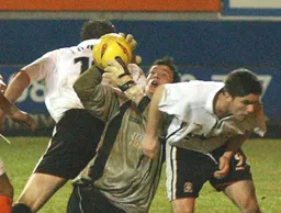 Steve Howard and Tony Thorpe lose out to the goalkeeper