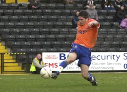 Tony Thorpe stretching for the ball