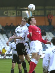 Ian Hillier jumps for the ball