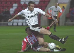 Steve Howard riding out the incoming tackle