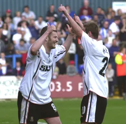 Kevin Nicholls celebrating with Peter Holmes