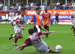 Chris Coyne gets past Iain Anderson