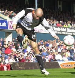 Paul Hughes gets in a cross from the right