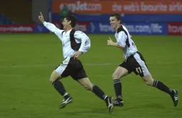 Steve Robinson has just levelled the score at 2-2. Kevin Foley joins in with the celebrations