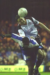 Chris Coyne climbs above Tresor Kandol