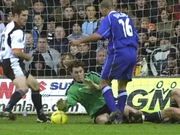 Marlon Beresford gets down to foil Simon Baldry