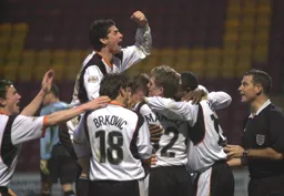 Steve Robinson gives a fist pump as Town celebrate their second goal
