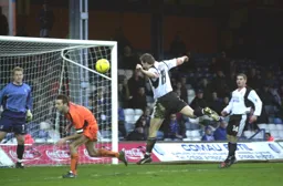 Steve Howard heads towards goal but Simon Brown was untroubled