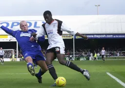 Enoch Showunmi brushes off Guy Branston