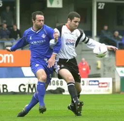 Chris Coyne holds off John Eyre