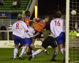 Michael Leary heads his second and Town`s third goal