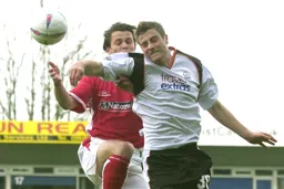 Michael Leary gets in front of Stefani Miglioranzi to win a header