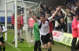 Comeback complete. Steve Howard celebrates after scoring the third goal