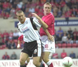 Steve Howard watches the ball flash past