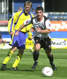 Steve Robinson leaves a Torquay defender standing