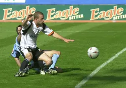 Rowan Vine slides in