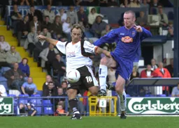Ahmet Brkovic is challenged just as he is about to shoot