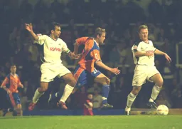 Peter Holmes bursts through the Swans defence