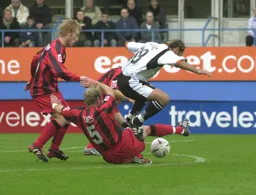 Ahmet Brkovic tries to burst rhough