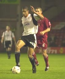Curtis Davies controls the ball