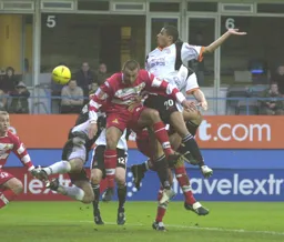Curtis Davies attacks a corner