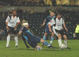 Stephen O'Leary nicks the ball away from a Wycombe defender