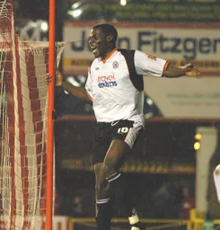 A delighted Enoch Shounmi after scoring the late winner